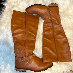 JUST FAB!! 💗🎉 Brown Faux leather boots, with studded strap on the bottom.